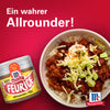 Ein Glas McCormick Feurice GewA?rz wird neben einer SchA?ssel Chili gezeigt, um seine Vielseitigkeit als Allrounder hervorzuheben.