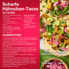 Ein lebendiges Bild mit scharfen HA?hnchen-Tacos mit frischen Zutaten, perfekt fA?r einen Food-Blog oder eine Rezept-Website.