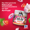 McCormick Air‑Fry Gewürzmischung mit Gemüse auf rotem Hintergrund.