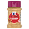 Ein durchsichtiges Glas McCormick Hähnchen Würzmischung, eine deutsche Gewürzmischung für Hähnchen, wird mit einem magentafarbenen Deckel und einem roten Etikett vor einem weißen Hintergrund gezeigt.