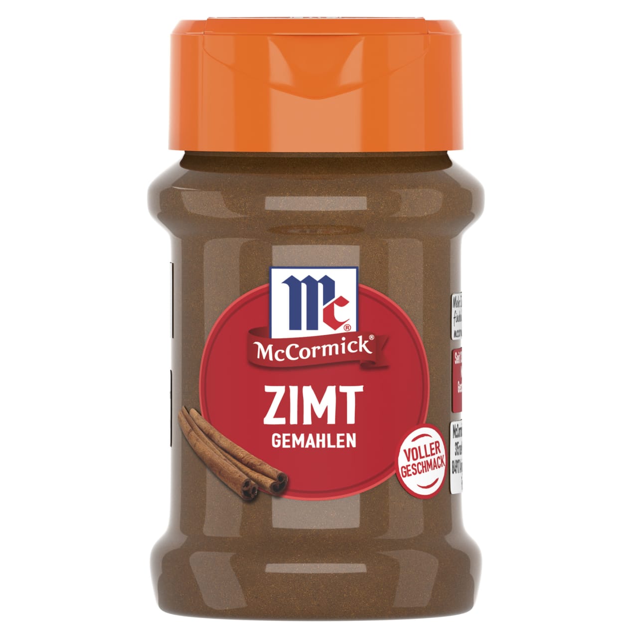 Ein durchsichtiges Plastikglas mit McCormick Zimt Gemahlen, mit einem orangefarbenen Deckel und einem roten Etikett, auf dem Zimtstangen abgebildet sind.