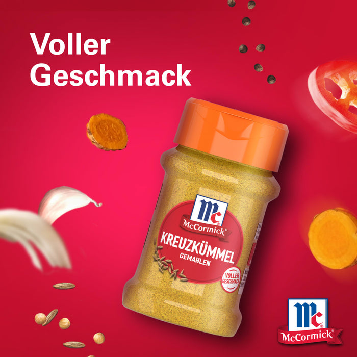 Eine Werbegrafik für Srpet Cumin Gd X06-Ge mit einem McCormick Kreuzkümmel Gemahlen Gewürzglas umgeben von schwebenden Zutaten wie Knoblauch und Kurkuma auf rotem Hintergrund mit dem Text Voller Geschmack.