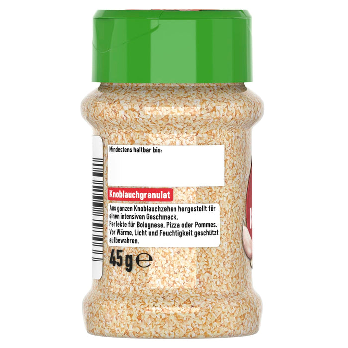 Ein durchsichtiges Gewürzglas mit grünem Deckel, gefüllt mit Knoblauchgranulat, zeigt ein deutsches Etikett, das das Produkt als Knoblauchgranulat ausweist.