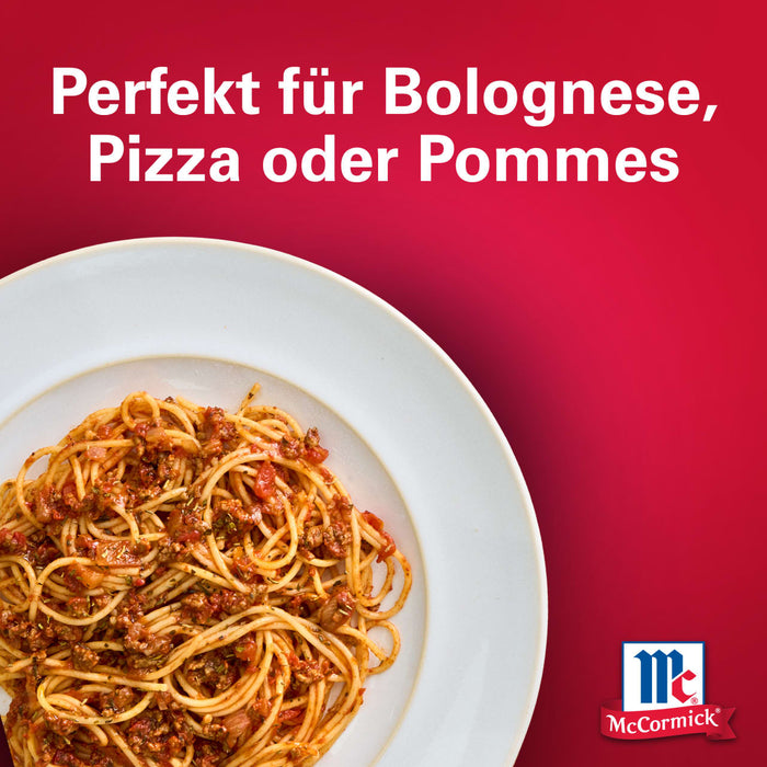 Ein Teller Spaghetti mit Fleischsauce verfeinert mit Srpet Garlic Granul X06-Ge wird vor einem roten Hintergrund mit dem McCormick Logo präsentiert.