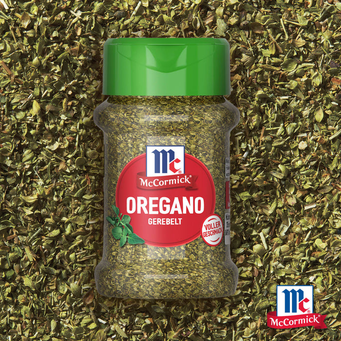 Eine Flasche Srpet Oregano X06-Ge von McCormick wird vor einem Hintergrund aus getrockneten Oreganoblättern präsentiert um den vollen Geschmack zu betonen.