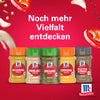Eine Werbegrafik mit einer Auswahl an McCormick Gewürzen einschließlich Srpet Oregano X06-Ge sowie Kreuzkümmel, Knoblauch, Kurkuma und schwarzem Pfeffer vor einem leuchtend roten Hintergrund mit schwebenden Zutaten.
