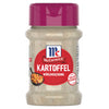 Eine durchsichtige Flasche McCormick Kartoffel Würzmischung, eine deutsche Gewürzmischung für Kartoffeln, wird mit ihrem charakteristischen roten Etikett und der magentafarbenen Kappe gezeigt.