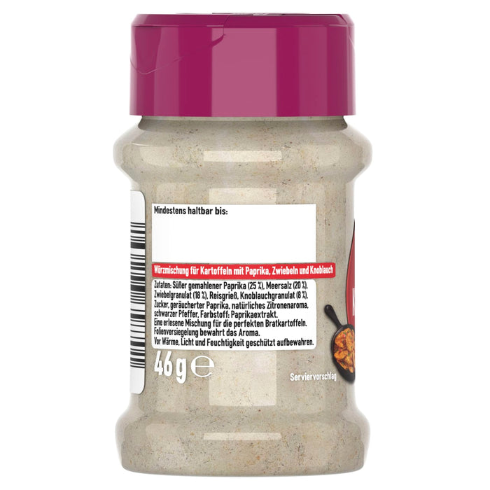 Die Rückseite eines durchsichtigen Gewürzglases mit magentafarbenem Deckel, die das deutsche Etikett für eine Würzmischung für Kartoffeln mit Paprika, Zwiebeln und Knoblauch zeigt, auf dem die Zutaten und das Nettogewicht aufgeführt sind.