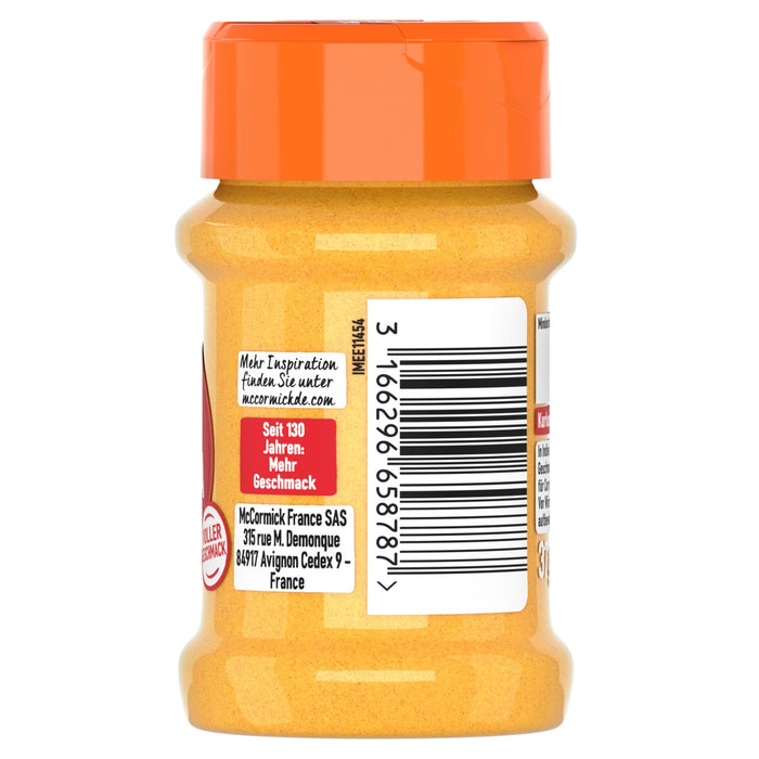 Die Rückseite eines McCormick Kurkuma-Gewürzglases, die das deutsche Etikett mit Markeninformationen, einem Barcode und der Firmenadresse zeigt.