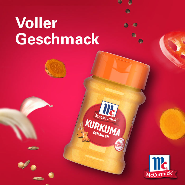 Eine Flasche Srpet Turmeric X06-Ge von McCormick wird vor einem leuchtend roten Hintergrund mit schwebenden Zutaten wie Kurkumascheiben und Pfefferkörnern präsentiert um den vollen Geschmack zu betonen.