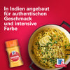 Eine Flasche Srpet Turmeric X06-Ge wird neben einer Pfanne Spaghetti mit Erbsen und Zitrone präsentiert um den authentischen Geschmack und die intensive Farbe aus Indien hervorzuheben.